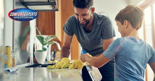 Father and son cleaning.
